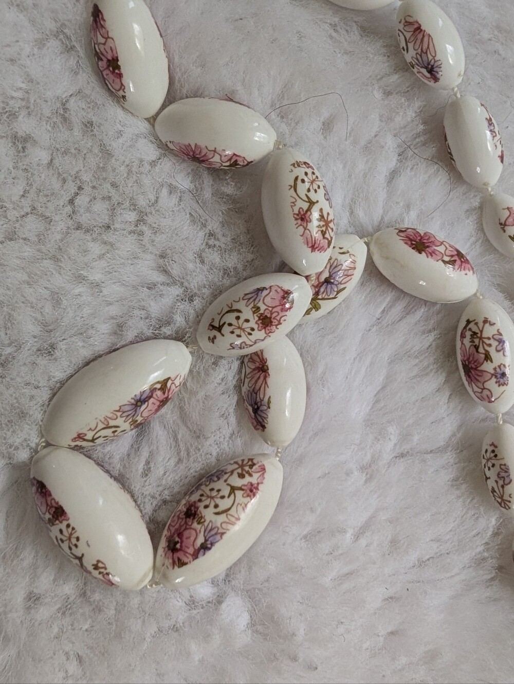 Handcrafted White Ceramic Bead Necklace with Pink Floral Accents